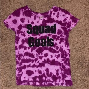 A tie dye shirt that says squad goals